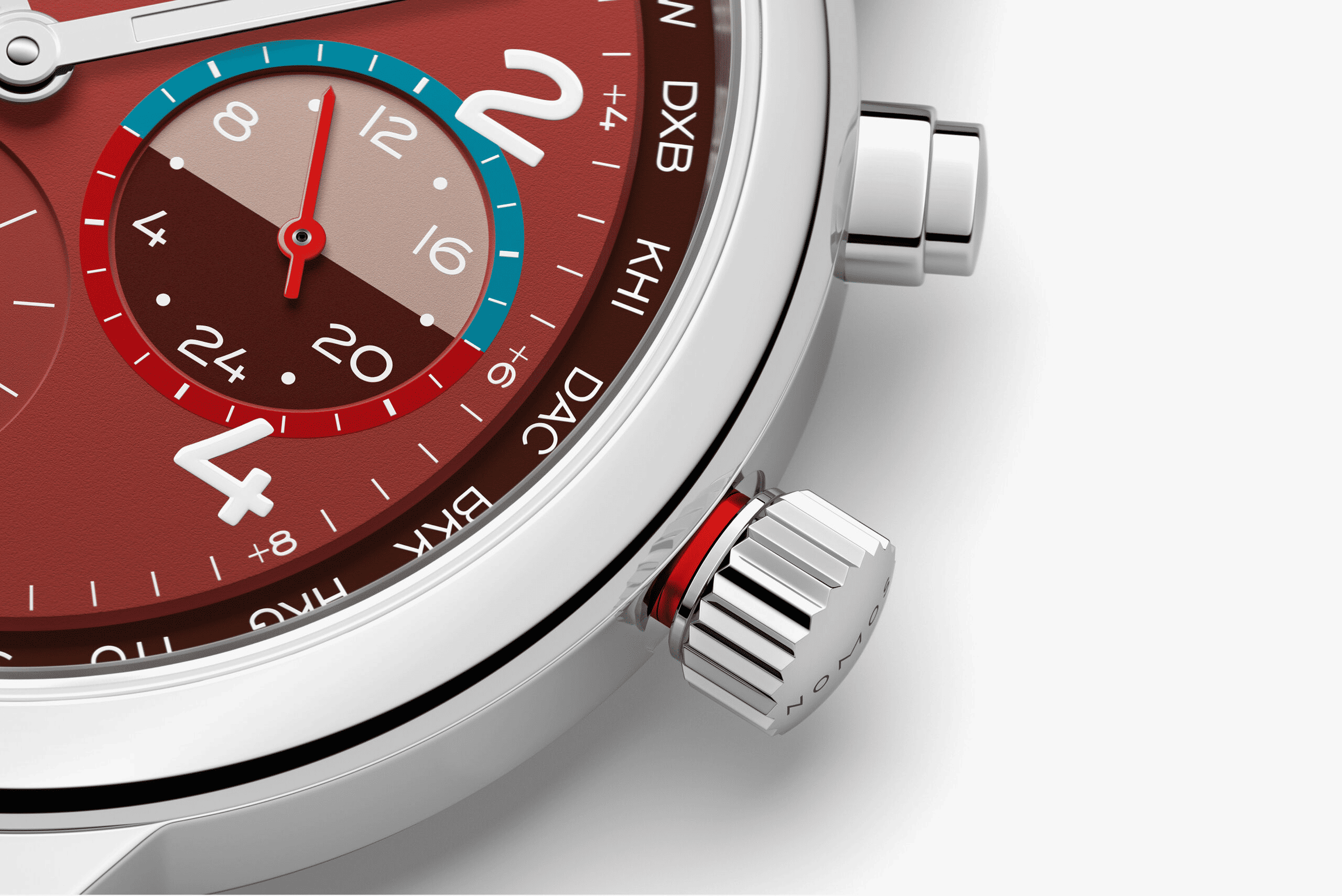 NOMOS GLASHÜTTE  クラブ・スポーツ ネオマティック ワールドタイマー「マグマ」　NM790.S5溶岩は奔流するエネルギーそのものです。この腕時計の燃えるような赤は、地面の下で輝く摂氏1000度のマグマを表現しています。ダイアルのこの情熱的な色に、冷却するかのようなライトブルーが、噴火の上の晴れた空のようなコントラストを生み出しています。自動巻きキャリバーを搭載するこのワールドタイム機能付き腕時計においては、スポーティーさと機能性が均衡しており、一目で24のタイムゾーンを見ることができ、セカンドタイムゾーンの24時間表示も備わっています。マグマは175本限定であり、世界との特別な自分だけの繋がりをもたらします。