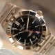 ブラックダイヤルにレッドカラーのGMT針が映える クロノマット オートマチック GMT 40 A32398101B1A1 【在庫あり】